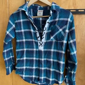 Blue flannel shirt with U of M patch  on back